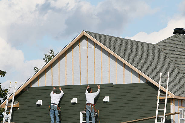 Professional Emergency Siding Repair technician working in Bellbrook, OH